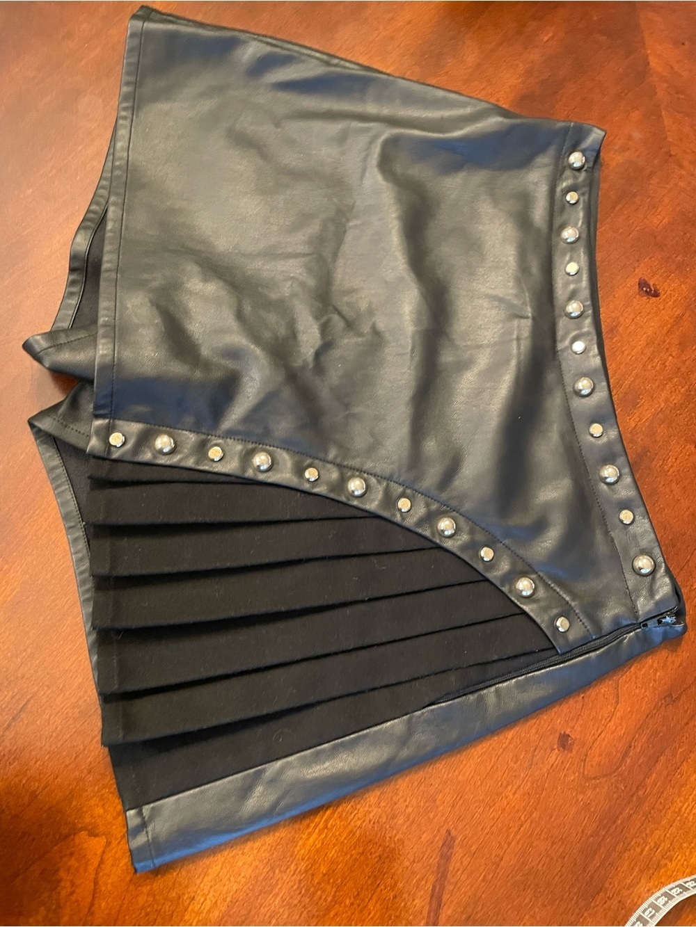 Black Faux Leather Mini Skirt with Studded Trim